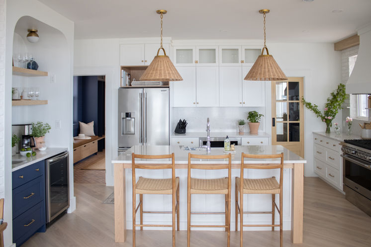 A modern kitchen meets country charm in this bright white kitchen