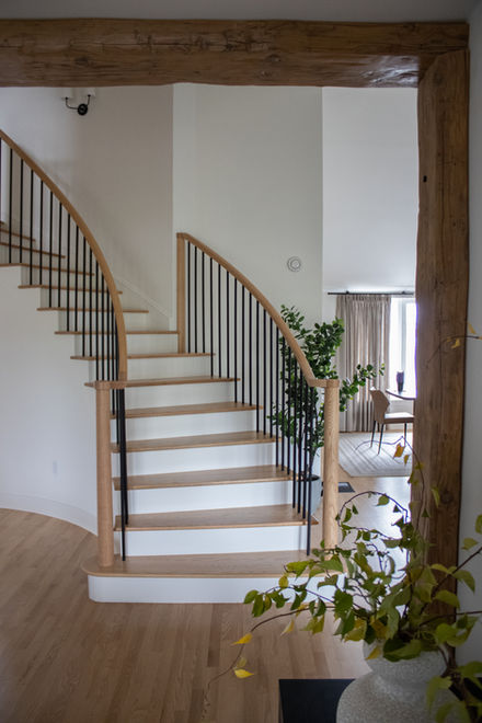 white and wood staircase remodel in a PEI home renovation