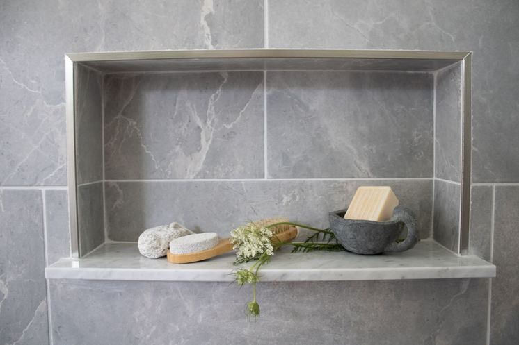 Stunning shelf inside the walk-in shower inside this PEI home