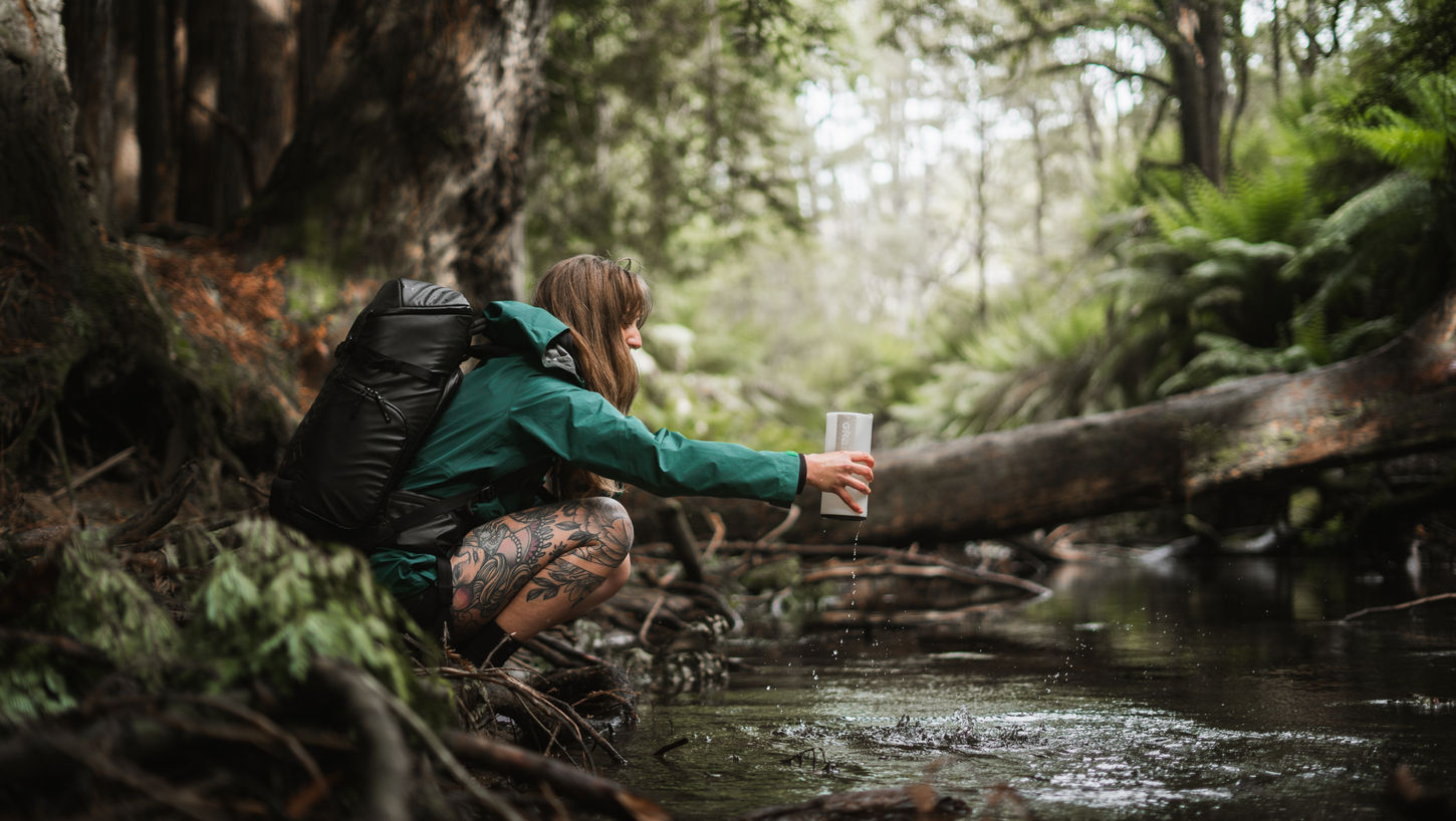 Camping scene with GRAYL gear in use

