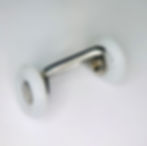Thumbnail: Carriage Wheels, white plastic wheels, chrome plate with small center hole, side of plate view