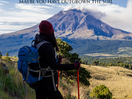 a woman hiking contemplating if she has outgrown her current position 