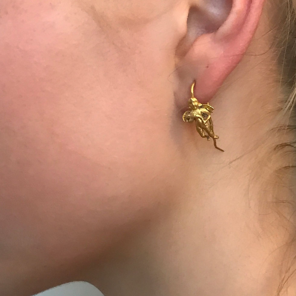 Thumbnail: Rare Hellenistic 22 Carat Gold Cherub Earrings
