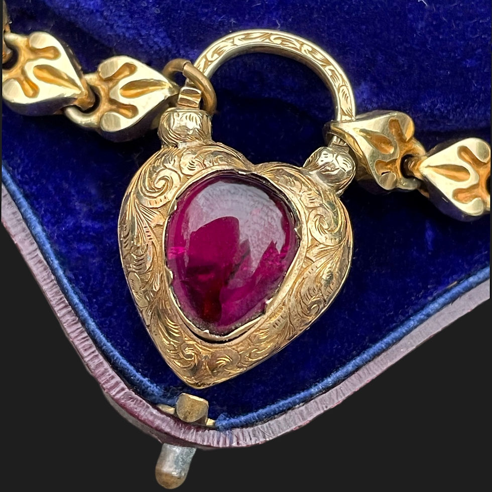 Thumbnail: Victorian 15 Carat Gold And Garnet Padlock Bracelet