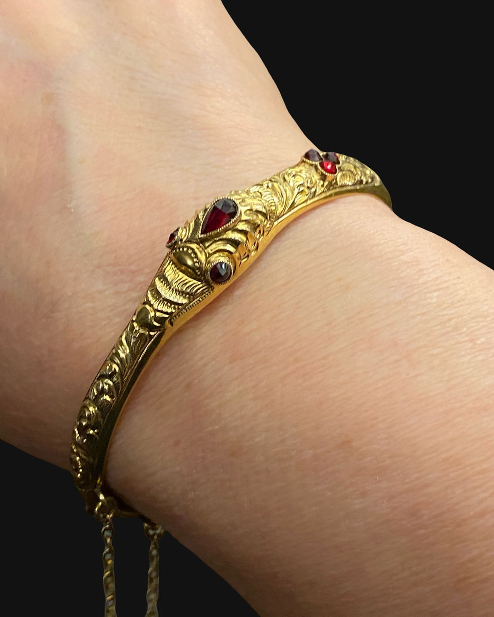 Thumbnail: Garnet And Gold Ouroboros Bracelet 