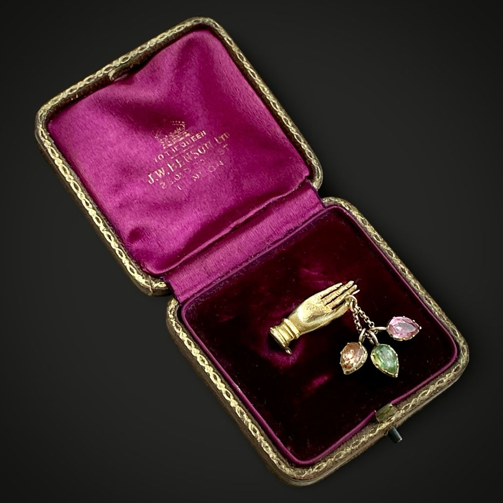 Thumbnail: Georgian Hand Holding Gemstone Hearts