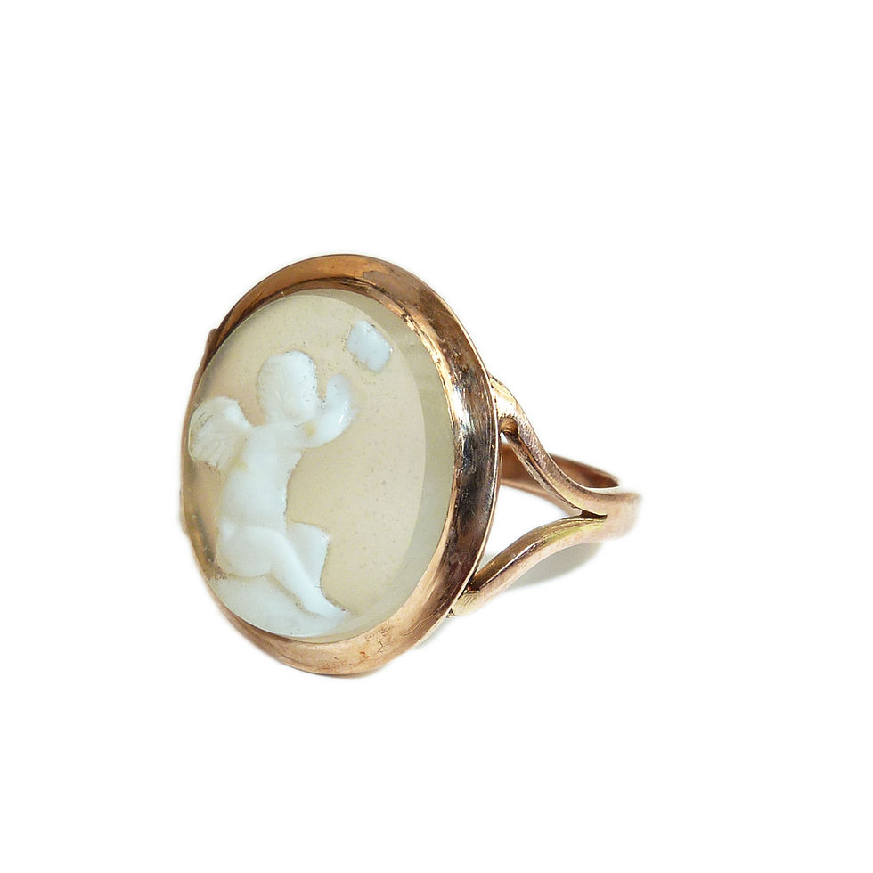 Thumbnail: Early Victorian High Carat Cameo Ring Depicting Cupid Playing With A Butterfly,