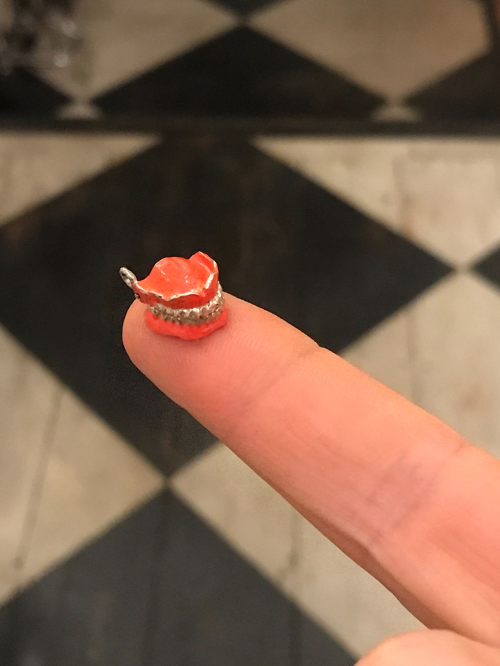 Thumbnail: Antique teeth charm