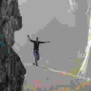 woman balancing on a tightrope