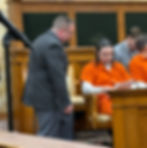 Jayden Cosme and public defender Jerad Marks before Cosme's sentencing.