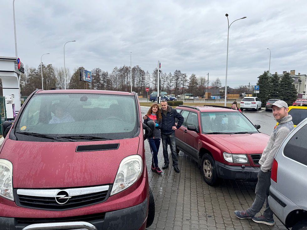 Paul handing off my Scooby-Suby to a Ukrainian doctor