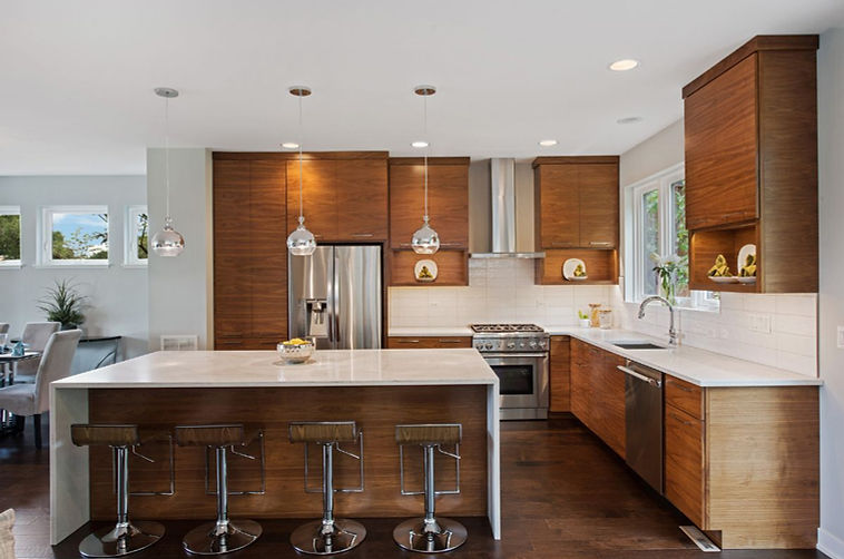 Stylish modern kitchen with wood cabinets and natural light, showcasing non-toxic design