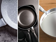 Side-by-side close-up of ceramic, nonstick, and stainless steel cookware laid on textured surfaces