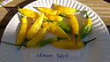 Here is the Lemon Drop Pepper also known as the ají limon pepper, Capsicum baccatum, Scoville units: 10,000 ~ 30,000 SHU. Do not let the sunny yellow color fool you! This variety originates from Peru with a nice kick of heat. The citrus-like, lemon-flavored pepper which is a popular seasoning pepper in Peru can produce over 100 fruits per plant! The Lemon Drop Pepper combines the heat of a cayenne with a lovely citrus baccatum flavor. Plants are heavy producers with 2 to 3 inch fruits covering this Peruvian variety. Excellent for cooking, freezing, hot sauce and salsas! Plants get to around 5 feet tall. Open pollinated 80 days.
