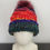 Thumbnail: Turbine Checkerboard Knit Hat in Red, Maroon, Yellow, Green , & Blue