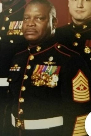 Billy Zinnerman wearing awards he never earned