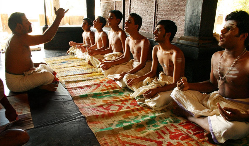 Men chanting during a Traditional Indian Education System class