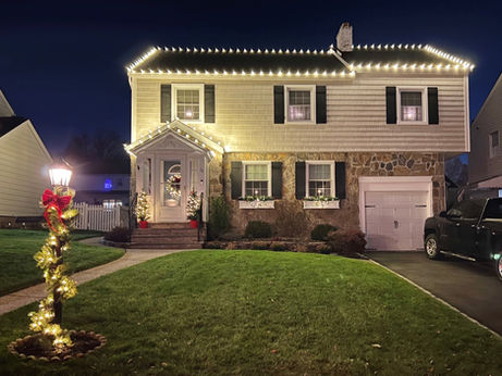 house decorated with christmas lights