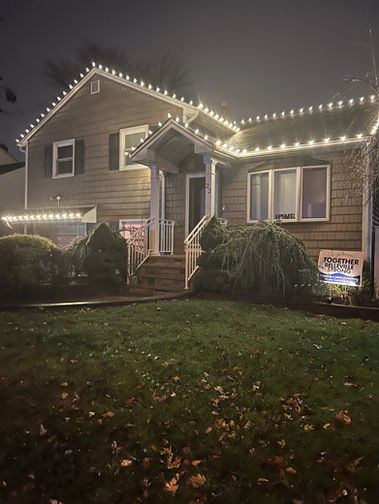 house decorated with christmas lights