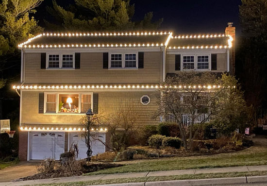 house decorated with christmas lights