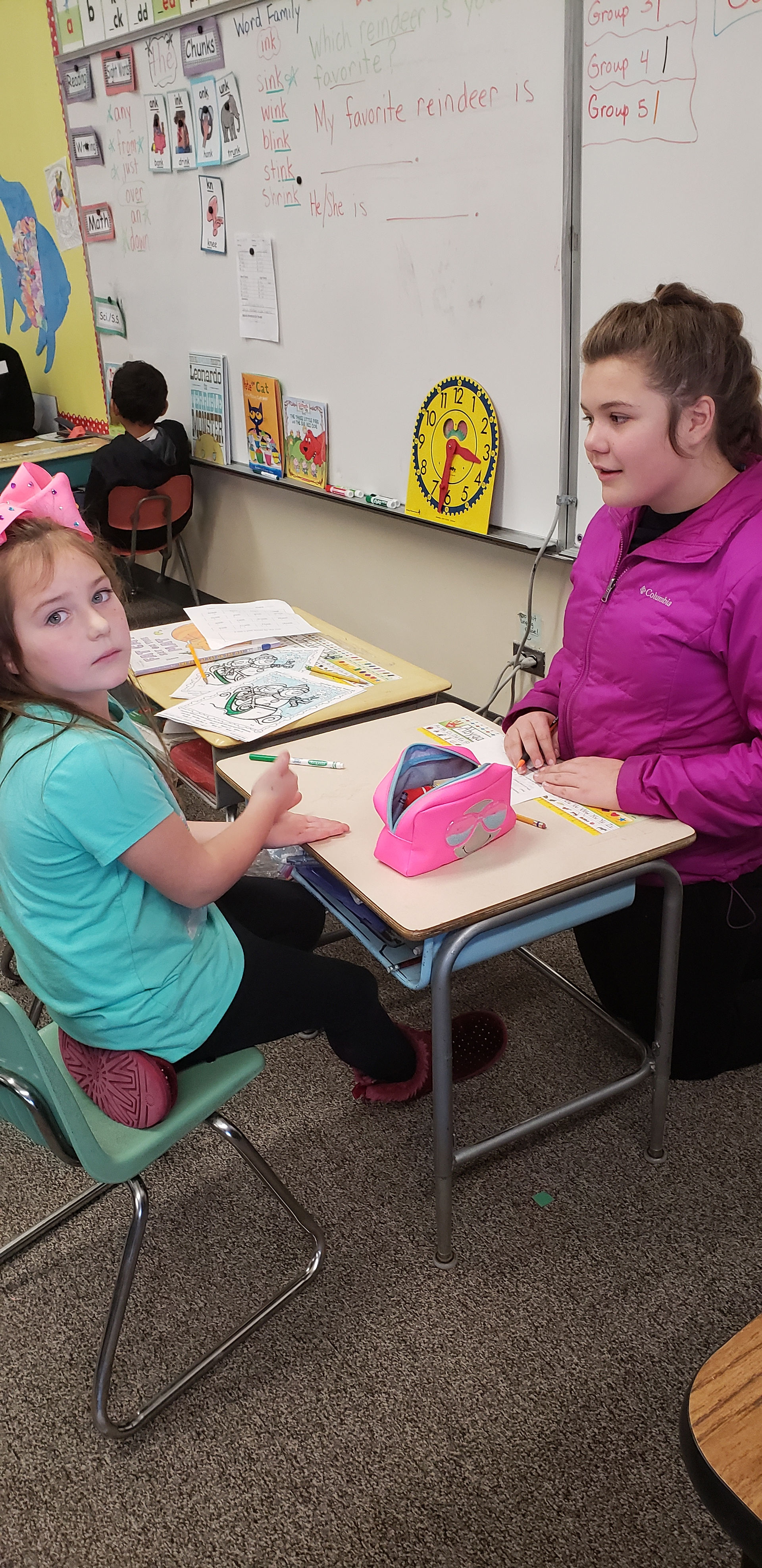 Learning to involve others ideas. BMS and PES Students work together.
