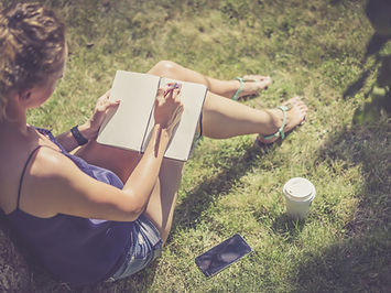 person writing their personal journey, "you can start where you are and change the ending"