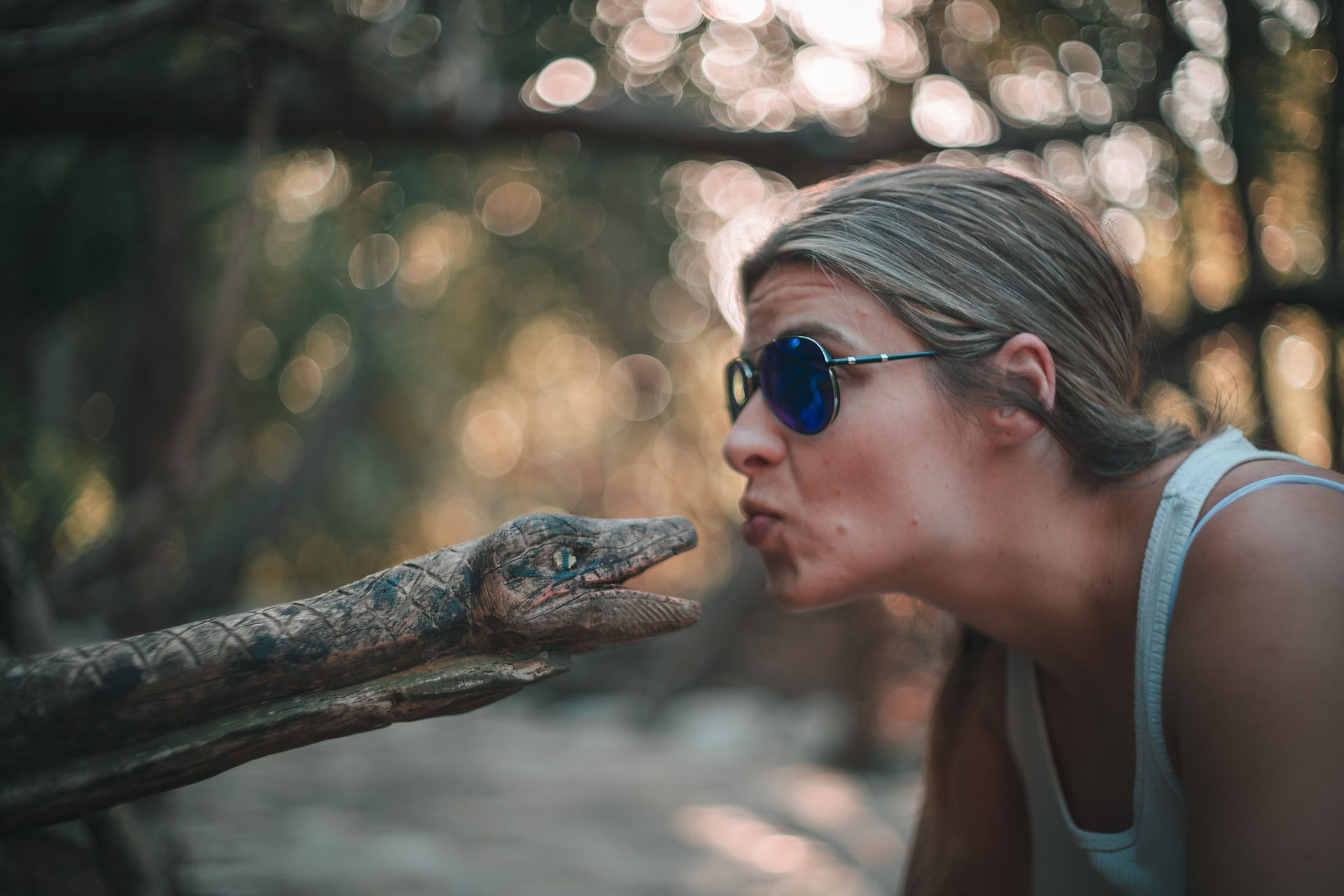 girl kissing snake