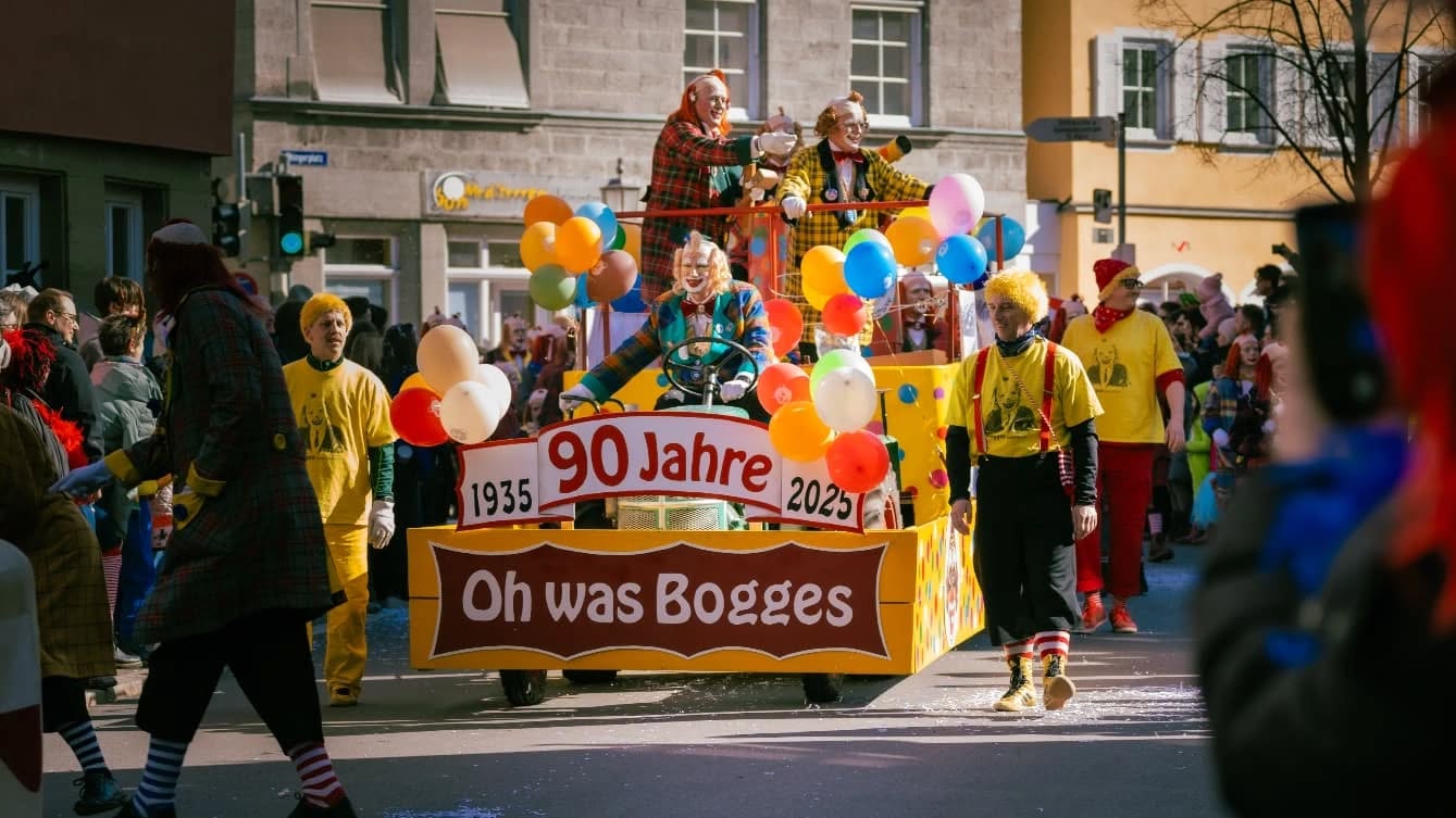 Wide angle shot of people dressed as clowns during the carnival parade in Germany