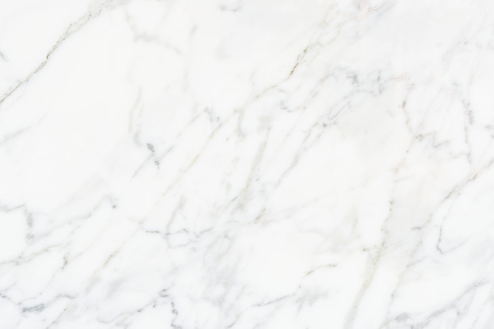close-up-white-marble-textured-wall.jpg