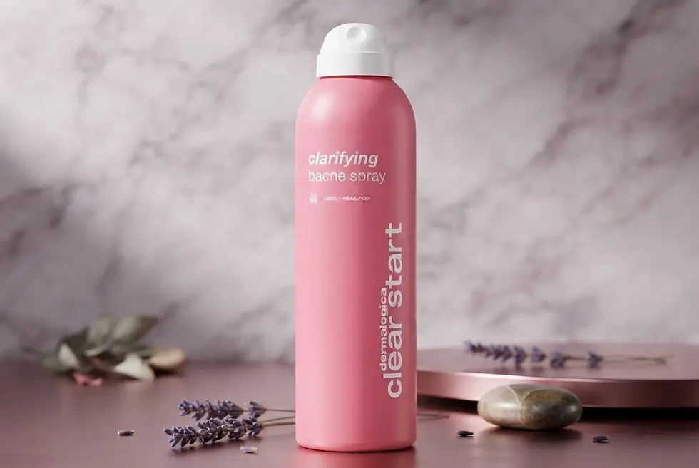 Packshot photography capturing a pink Dermalogica Clear Start clarifying body spray bottle. The item is displayed on a minimalist surface with a sprig of lavender for a clean, spa-like aesthetic.