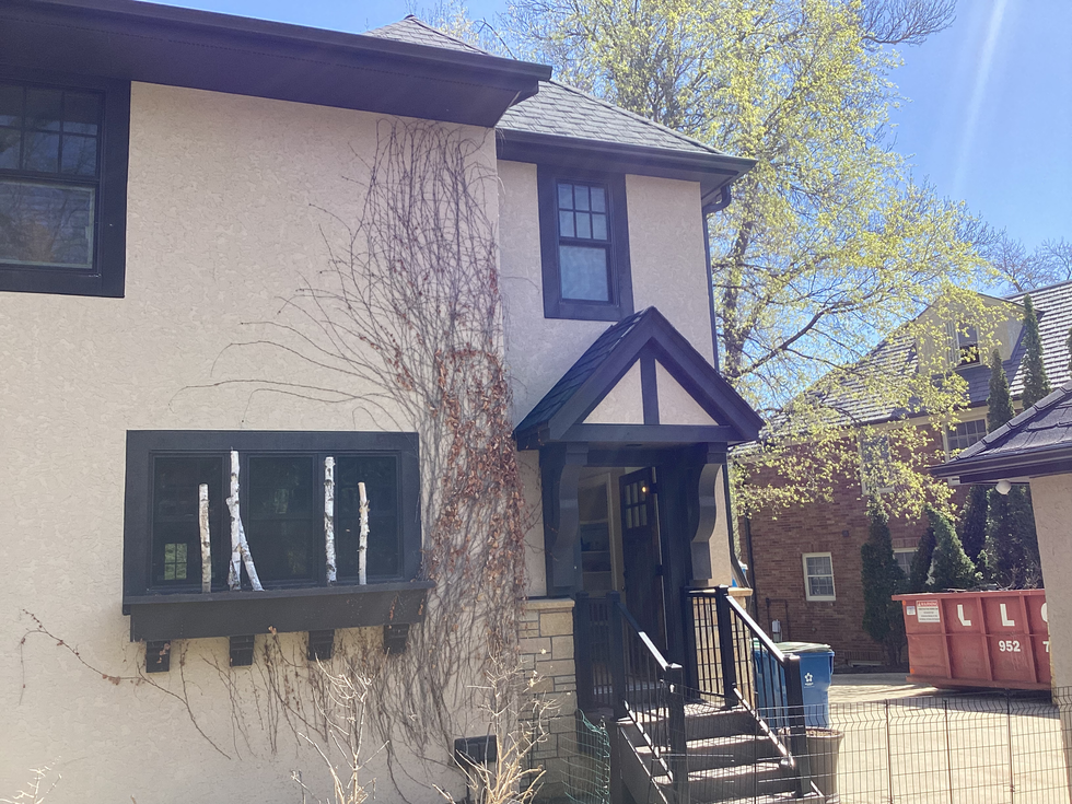 Edina tudor home needing vine removal and exterior painting