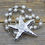 Thumbnail: Starfish Pendant With White Beads.  At The Beach Collection.