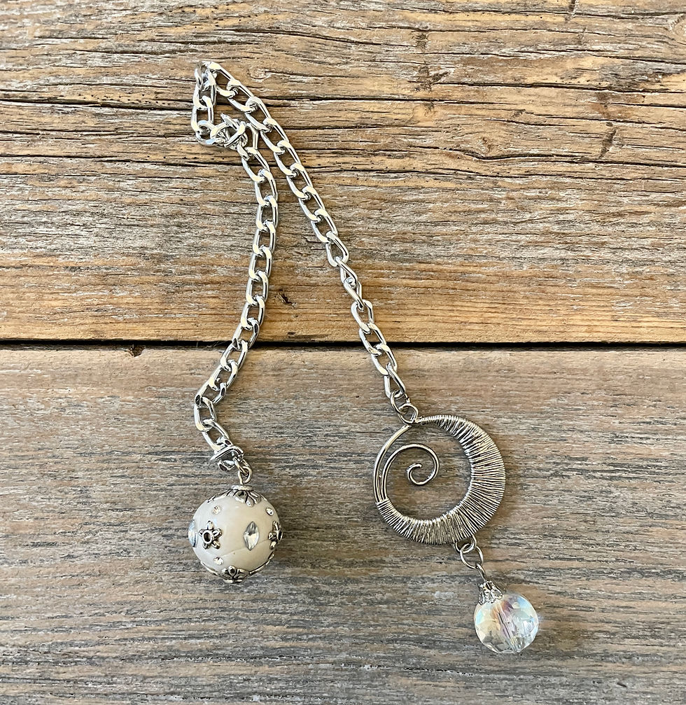 Thumbnail: Spiral Crystal Pendulum.