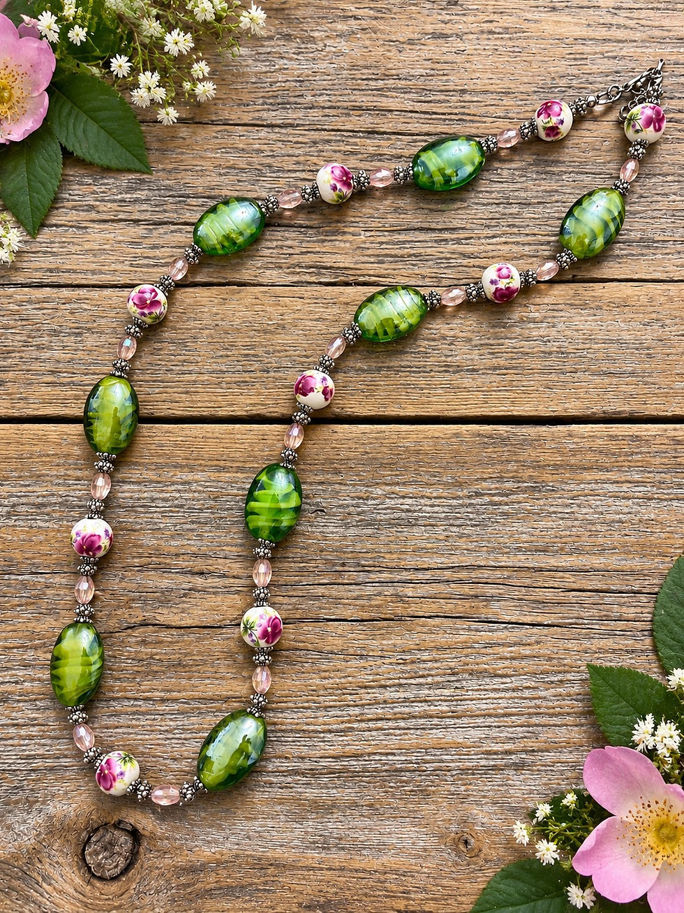 Thumbnail: Briar Rose handcrafted green lampwork and pink floral beaded necklace from the Fae Bella Fairy Glade Collection