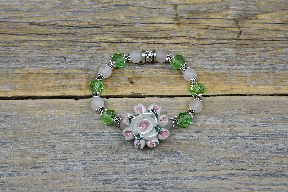 Flower Bracelet with Rose Quartz and Green Crystal Beads.