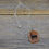 Thumbnail: Red Orange Aventurine Stag Cave Painting Pendant with Chain.