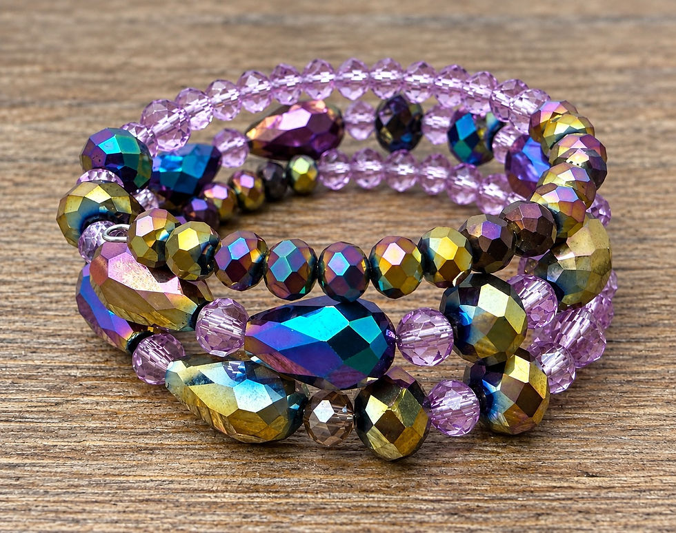 Mystic Dusk three-tier memory wire bracelet with lavender and iridescent purple, teal and gold faceted beads
