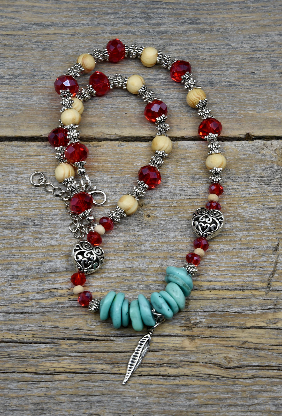 Thumbnail: Feather and Heart Charm Necklace.