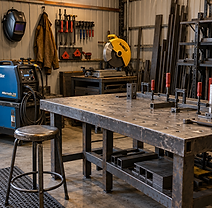 Industrial Welding Workshop with Fabrication Table.png