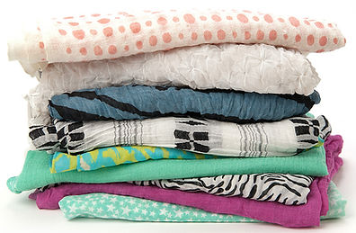 Mending/hemming of scarves, sheets, duvet covers, including button replacement.