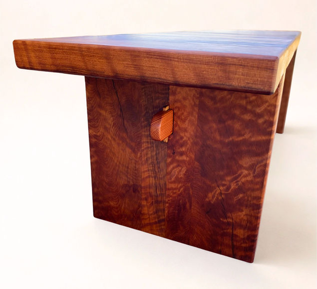 Detail side view of handcrafted old-growth redwood parlor bench with hand-driven trestle wedge