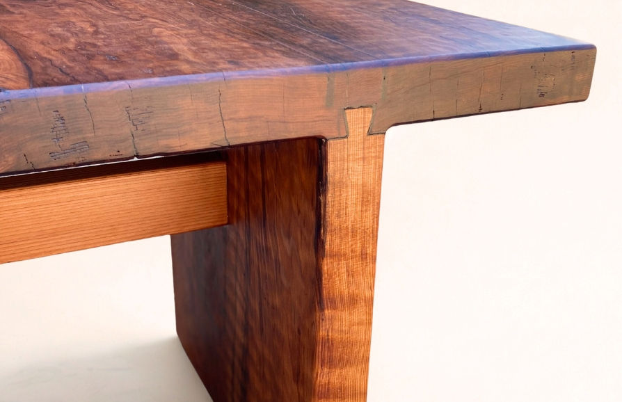 Handcrafted wooden benches with clean lines and sculpted forms