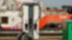 A marine charging pedestal connected to the BC2.0 system, positioned at a dock in front of Singapore's all-electric harbour tug EON.