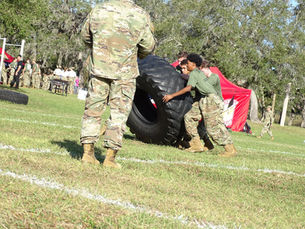 Lennard High School Army JROTC Raider cadets competing in a tire flip event