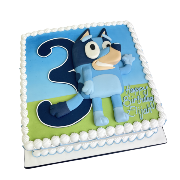 Beautifully decorated 12" square Bluey cake, perfect for birthdays and celebrations. Vibrant colours and intricate details make this cake a showstopper.