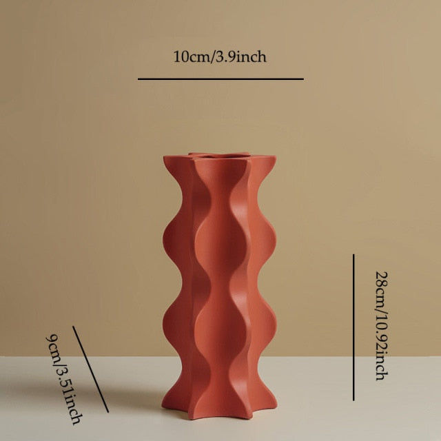 Thumbnail: geometric sculpture vases