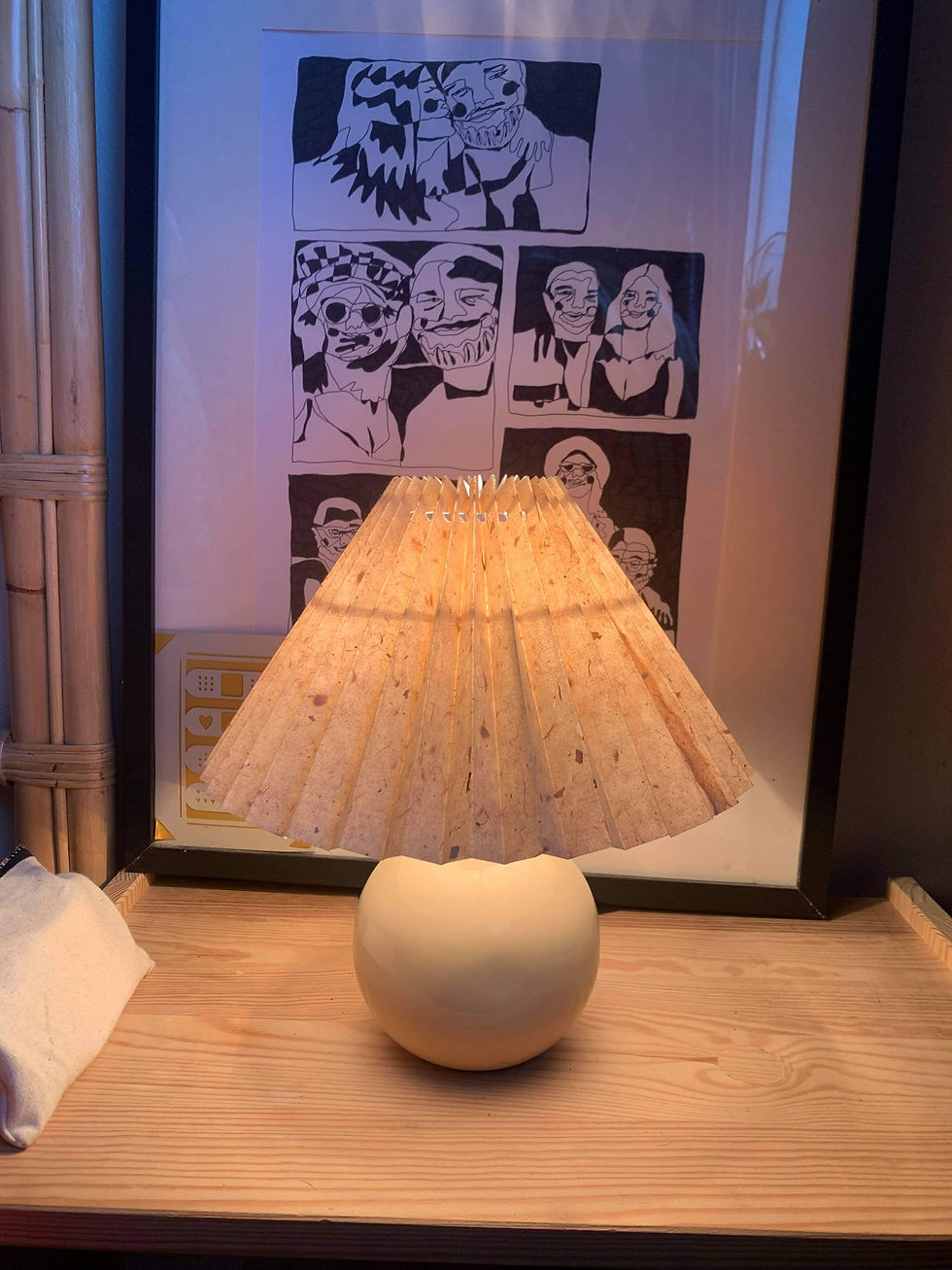 Thumbnail: pleated lamp with ceramic, wood or rattan base
