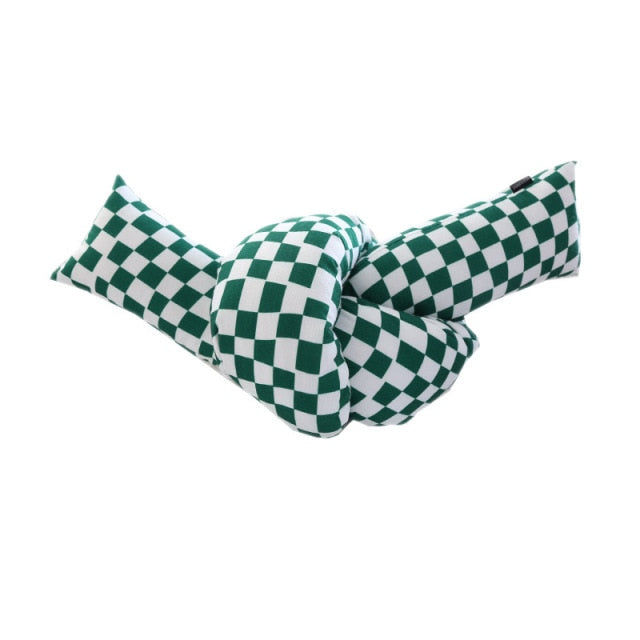 Thumbnail: checkered knot pillow
