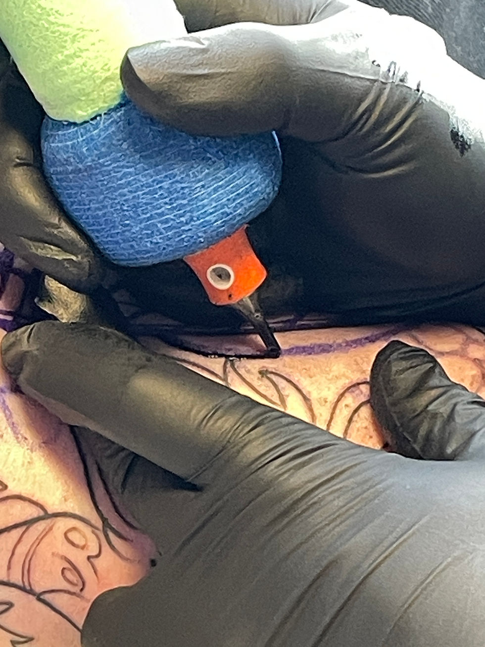 Brando of Saint and Stellar Tattoo doing what he loves to do.