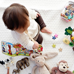 Toddler with Toys